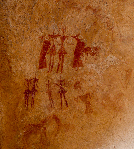 a picture of a group of people on a rock