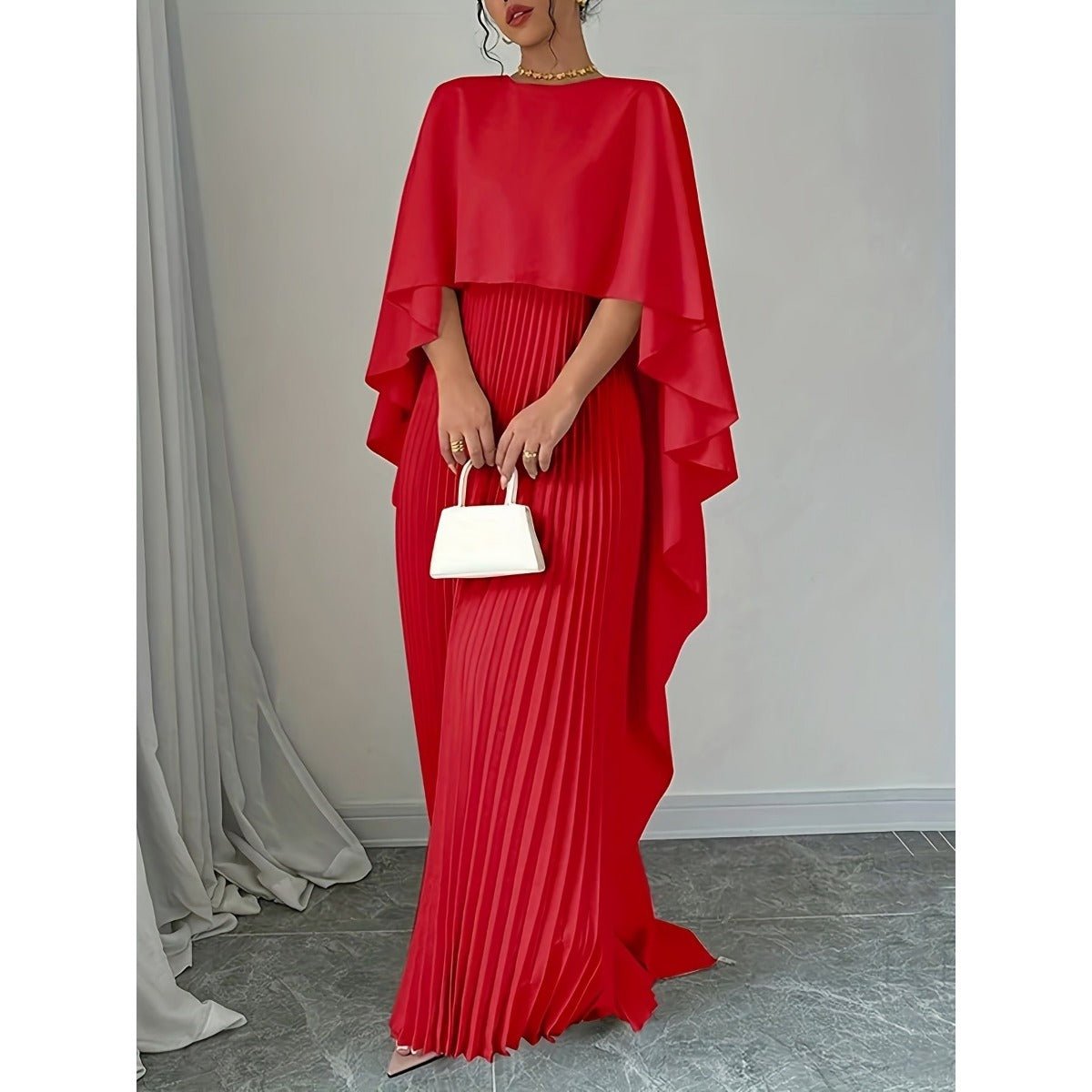 Veda – Robe longue plissée en mousseline à col montant Modesia